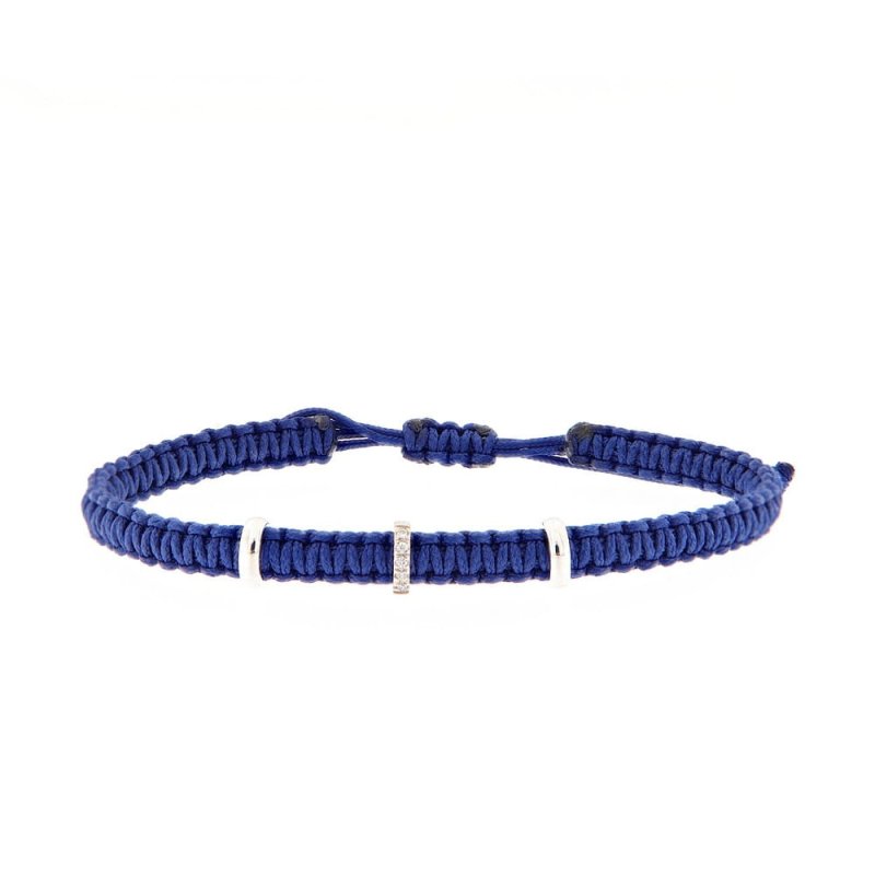 Pulsera macramé azul, 2 óvalos lisos y 1 con btes.