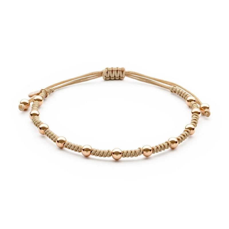 Pulsera hilo macramé con bolas de oro rosa