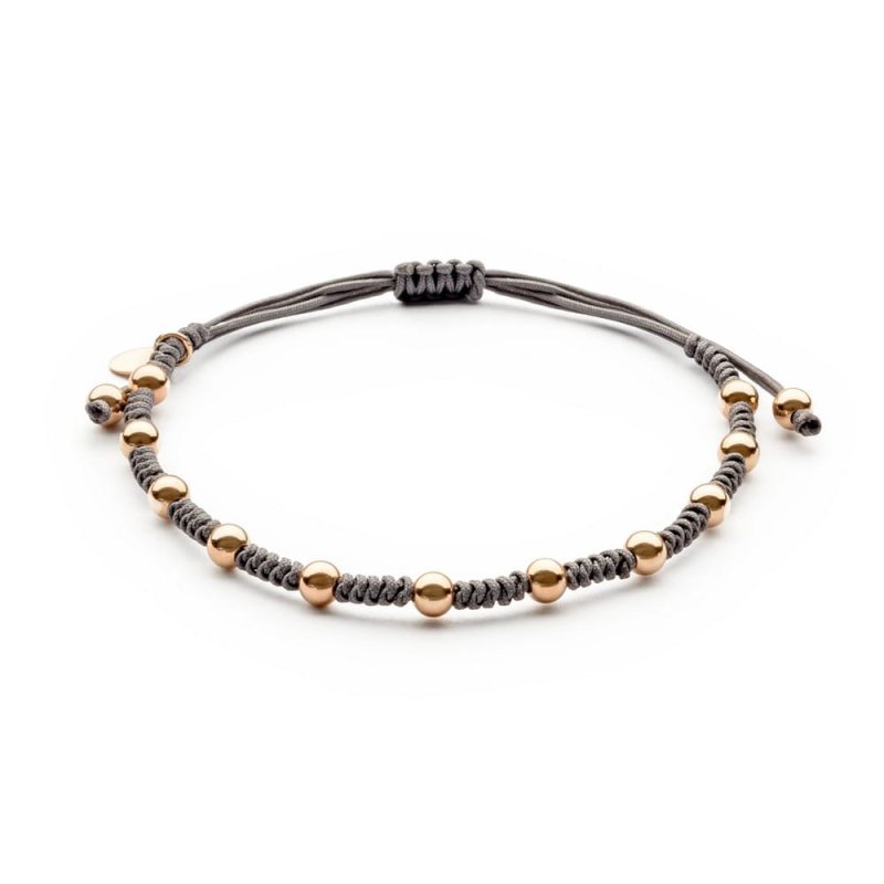 Pulsera hilo macramé con bolas de oro rosa